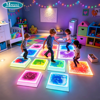 Equipo Sensorial para Autismo, Baldosas LED Líquidas para Piso y Piedras Redondas para Ponerse Encima, Juego Sensorial Interactivo