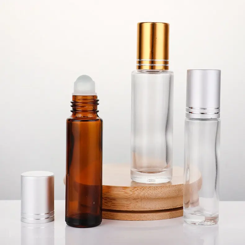 Botella enrollada de cristal con forma redonda, contenedor de aceite esencial para el cuidado de la piel, embalaje cosmético, muestra gratis, precio al por mayor