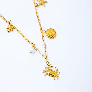Collar de acero inoxidable con diseño minimalista de estilo europeo y americano, con temática marina, con estrella de mar, concha y perla, ideal para vacaciones en la playa. - Product Image 1