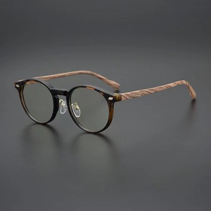 Lunettes de vue légères de style 2026, vintage, anti-lumière bleue, montures rondes de créateur, lunettes <span class=keywords><strong>en</strong></span> <span class=keywords><strong>bois</strong></span> grainé - Product Image 1