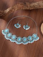 Parure de bijoux vintage ethnique incrustée de pierres turquoise, idéale pour les tenues quotidiennes et les soirées, collier et boucles d'oreilles pour femme