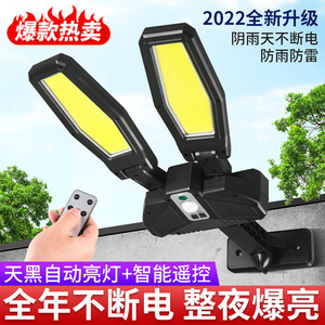 Lámpara solar de pared para exteriores con doble cabezal LED de 12V, impermeable, con sensor de movimiento para jardín, garaje, patio. - Product Image 1