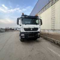 Camion benne Sinotruk HOWO TX 8x4 reconditionné fiable avec moteur MAN, d'occasion, pour l'exploitation minière intensive