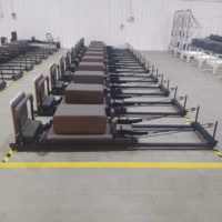 Máquina Reformer de Pilates Plegable de Aluminio Telescópico Negra para Uso Comercial, en Estudio o en Casa