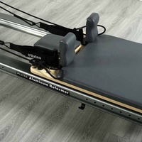 Queenlife noir alliage yoga usage commercial pleine piste aluminium réformateur pilates machine avec boîte et planche à sauter