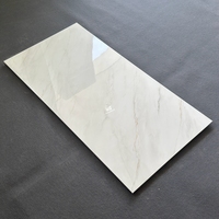 Carreaux de sol en porcelaine effet marbre blanc brillant veiné doré 1,20x0,60 (600x1200)