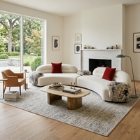 Canapé d'angle incurvé de luxe au design moderne en tissu haut de gamme pour salon