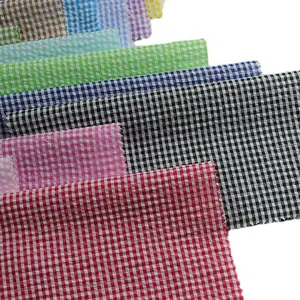 Knitting manufacturer yarn dyed 110gsm cvc 65%poly 35% cotton seersucker jacquard fabric for dress