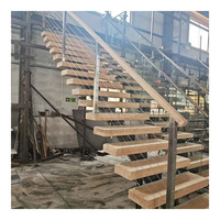 Escalier droit moderne à monopoutre pour intérieur, marches en bois massif, garde-corps en câble d'acier inoxydable, pour appartement et villa