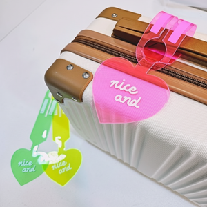 Borsa per bagaglio trasparente a forma di cuore con carta di nome accessorio unico ed elegante - Product Image 1