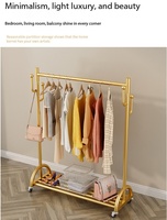Porte-manteau moderne minimaliste en métal avec système d'ancrage au sol, séchoir multifonctionnel pour balcon domestique