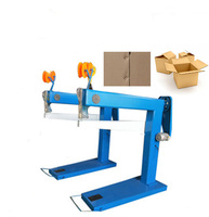 Machine à coudre industrielle pour boîtes en carton ondulé