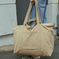 Sac fourre-tout de shopping pour le week-end en toile de coton avec logo personnalisé, sangle de bagage, doubles poignées et fermeture éclair