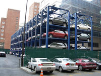 Système de stationnement de voiture à levage automatique à tour de peigne de traction rapide à plusieurs niveaux