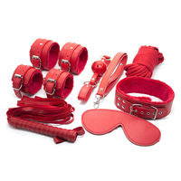Set Perlengkapan Pengikat Kulit Merah 7 PCS: Kalung, Manset Pergelangan Tangan dan Kaki, Penutup Mata, Tali, dan Cambuk