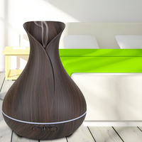 Chine Vente en gros Vase à grain de bois foncé Parfum électrique Mini aromathérapie Parfum Air Huile essentielle Diffuseurs d'arôme
