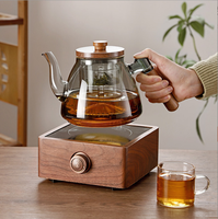 Théière en verre populaire de 1000 ml avec infuseur en verre et ensemble de théière en verre à haute teneur en borosilicate plus chaud