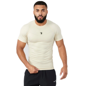 T-shirts de sport sans coutures ultra-extensibles à séchage rapide, coupe ajustée, avec logo frontal et compression pour hommes - Product Image 1