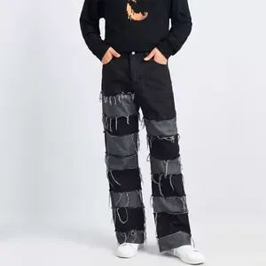 Fornecedor de marcas internacionais, moda emendada borla preta street wear casuais zíper calças de brim