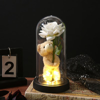 Rose éternelle artisanale avec un adorable ours en peluche qui s'abîme dans une dôme acrylique, cadeau romantique créatif pour la Saint-Valentin, vente en gros