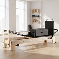 Appareil de Pilates haut de gamme personnalisable en bois d'érable avec résistance réglable, idéal pour les studios de Pilates, vente directe d'usine