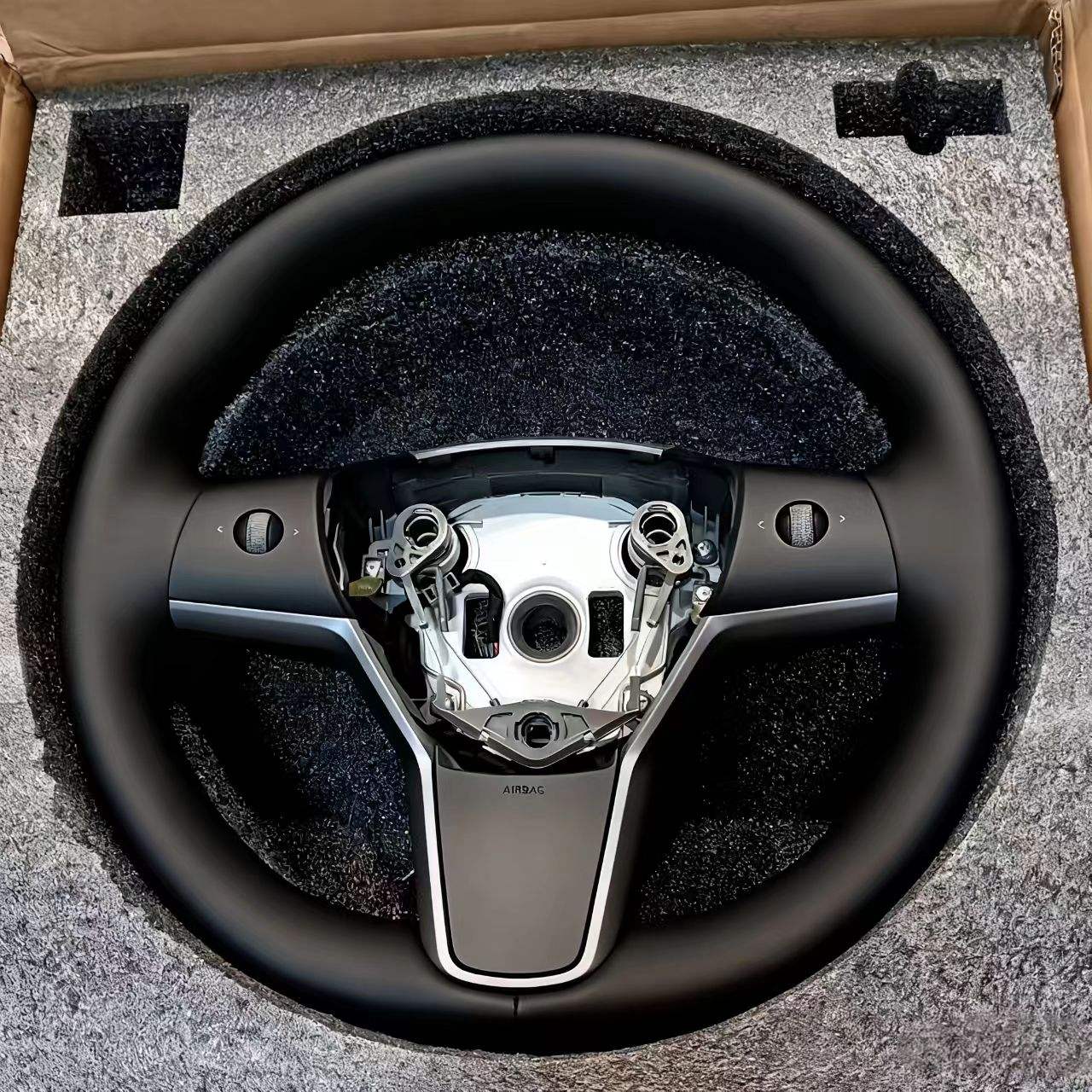 Posición del orificio central del Model Y con calefacción.