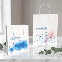 Sac de shopping en papier de luxe personnalisé avec logo imprimé, cordon de serrage et poignée, fabriqué par un fabricant à prix abordable