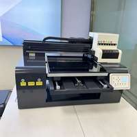 Imprimante jet d'encre UV à plat A4 A3 5060 6090 9060 avec système à pression négative et séchage rapide pour l'impression de coques de téléphone et de souvenirs