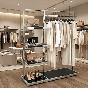 Moderno Perchero de Acero Inoxidable de 3 Niveles con Estantes para Exhibición en Tiendas y Boutiques - Product Image 1
