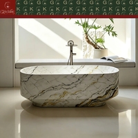 Baignoire ovale autoportante en marbre doré GOLDKING pour penthouse de luxe, rebord sculpté, OEM, alignement des veines CNC, poli