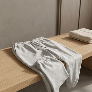 Pantalon de survêtement unisexe gris en coton, taille mi-haute, cordon de serrage, coupe ample, longueur intégrale, couleur unie, poches latérales, respirant, pour l'automne - Product Image 1