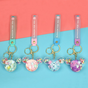 Vente en gros de perle d'huile tête de <span class=keywords><strong>Mickey</strong></span> coulant sable porte-clés pendentif boucle personnalisé livre sac acrylique poupée pendentif - Product Image 1