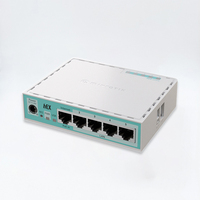 Routeur Domestique Gigabit Mini MikroTik RB750Gr3 5 Ports ROS Soft Routing avec CPU 880MHz 256Mo RAM FTTH IP PoE pour Maison et Entreprise