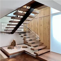 Escalier flottant moderne en bois avec poutre en acier |   Conception personnalisée d'escaliers intérieurs