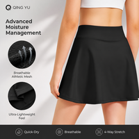 Jupe de tennis premium unie taille haute pour femme, extensible, avec logo frontal, short intégré et poches, idéale pour le yoga, le golf, la course et la gym