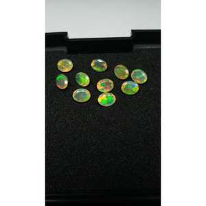 Ópalo Blanco Etíope de Alta Calidad Welo Fire Natural 8x10mm Ovalado Calibrado Gema Suelta Facetada Corte Suelto Venta al por Mayor - Product Image 3