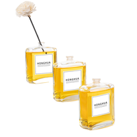 Vente en gros de flacons d'huile aromatique en verre transparent personnalisés avec bouchons compte-gouttes et boîtes cadeaux assorties pour les huiles essentielles