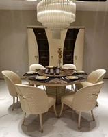 Table ronde en céramique à une seule jambe et chaises en cuir pour salle à manger