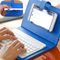 Trend Olan Ucuz Yeni Bilgisayar Aksesuarları iPhone Mini Taşınabilir Şarj Edilebilir Klavye Kılıfı Telefon Kılıfı Oyun Kablosuz Klavyesi