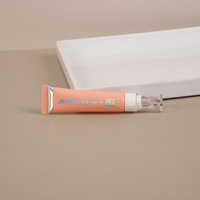 Tube de brillant à lèvres rond de 5ml 10ml 15ml 30ml avec logo personnalisé en alliage de zinc en silicone blanc or rose avec motif de compression