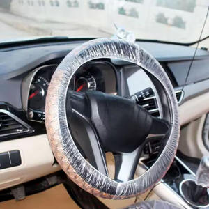 Housse de <span class=keywords><strong>volant</strong></span> <span class=keywords><strong>jetable</strong></span> fabricant personnalisé en gros avec élastique pour la protection du <span class=keywords><strong>volant</strong></span> de voiture - Product Image 1