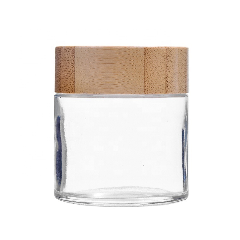 hot sale 3OZ hemp Packaging 2oz 4oz clear glass jar arch child resistant cap CR jar child proof bottle with bamboo lids 52D 62H