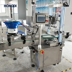 Ligne d'embouteillage de poudre entièrement automatique avec trieuse de bouteilles, remplisseuse à vis sans fin, machine de bouchage et d'étiquetage, et table d'accumulation rotative - Product Image 6