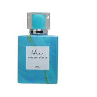 Botella de Perfume de Vidrio de 50 ml con Cabezal Pulverizador, Decoración Personalizada, Venta Caliente, Precio Bajo, Transferencia de Calor al Vacío, Efecto Marmoleado Azul Cielo