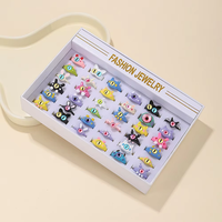Coffret cadeau 36 pièces mignon dessin animé chat gros oeil boîte à bagues résine mauvais œil petit diable petit monstre fête mariage bague vente en gros