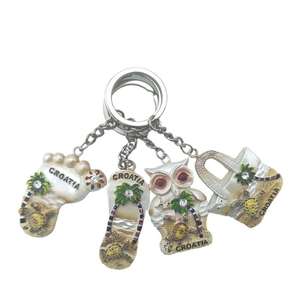 Nouveauté : Porte-clés en résine en forme de tortue marine, style marin, marque JXF - Souvenir touristique, cadeau promotionnel, agence de voyage - Product Image 1