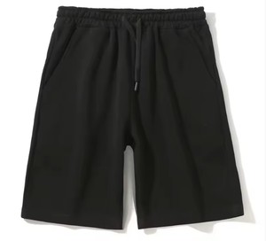 Pantalones cortos deportivos de verano para hombre con algodón transpirable, corte holgado y diseño de talla grande, ideales para un confort informal de cinco puntos. - Product Image 1