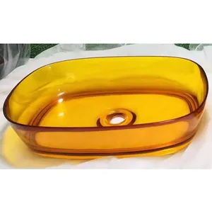 Sarı renk ile Modern şeffaf reçine lavabo otel Oval şekil temizle Polyester lavabo