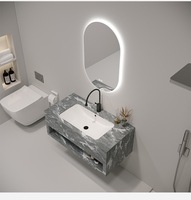 Meuble de salle de bain de luxe avec lavabo mural en pierre sous comptoir, meuble double vasque, lavabo, vasque en pierre d'ardoise.
