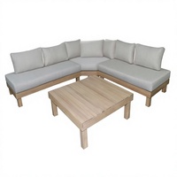 Ensemble de canapé d'angle en acacia avec structure en bois massif, finition résistante aux intempéries, coussins épais et configuration modulaire pour l'extérieur